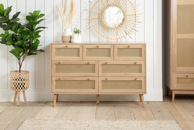 Elegant Croxley Rattan 7 Drawer Chest available in Black or Oak