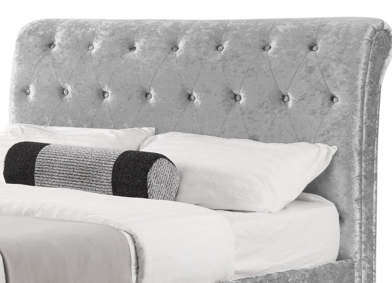 Striking Verona Sleigh Bed Upholstered in a Silver Crushed Velvet available in 4FT6 & 5FT