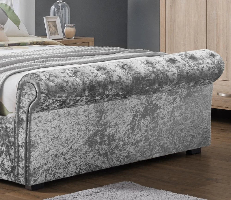 Striking Verona Sleigh Bed Upholstered in a Silver Crushed Velvet available in 4FT6 & 5FT